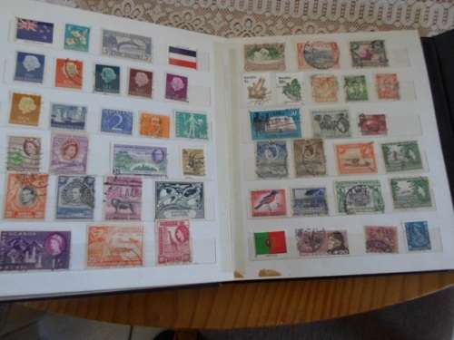 ALBUM MIXED WORLD STAMPS USED AND MINT  MANDELA HIGH VALUE INCLUDED SEE PICS