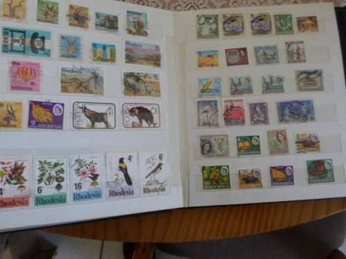 ALBUM MIXED WORLD STAMPS USED AND MINT  MANDELA HIGH VALUE INCLUDED SEE PICS