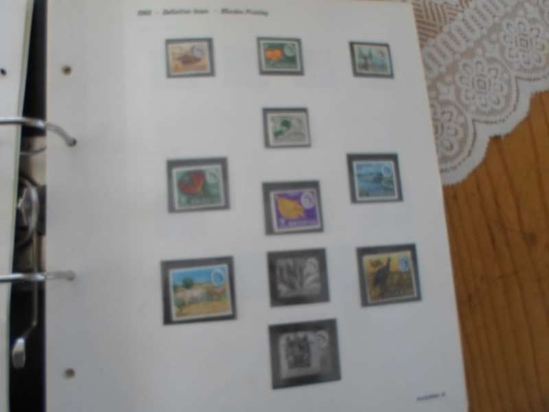 FILE RHODESIA MINT STAMPS ONLY SOME PAGES SCANNED SEE PICS