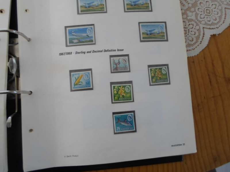 FILE RHODESIA MINT STAMPS ONLY SOME PAGES SCANNED SEE PICS