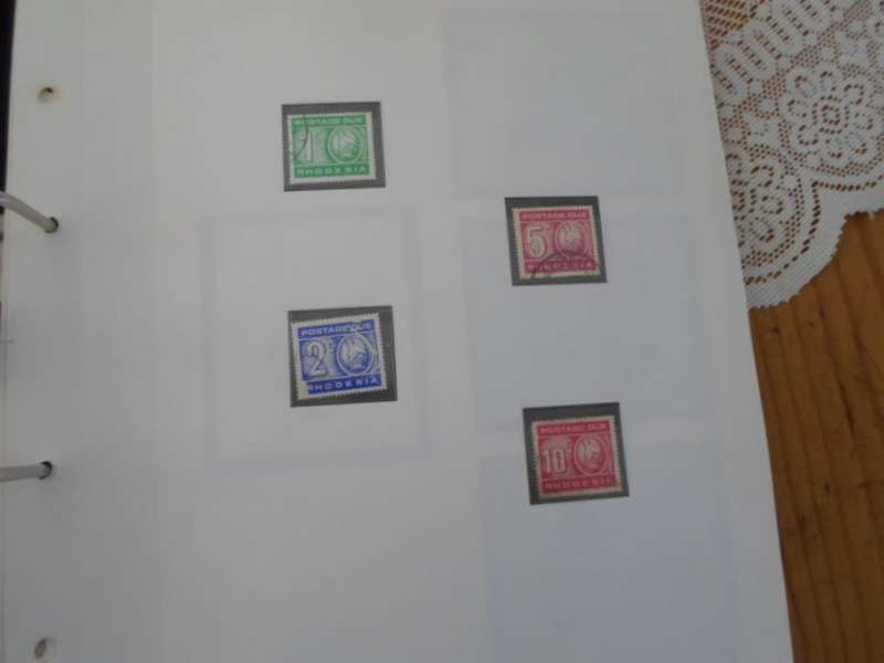 FILE RHODESIA MINT STAMPS ONLY SOME PAGES SCANNED SEE PICS