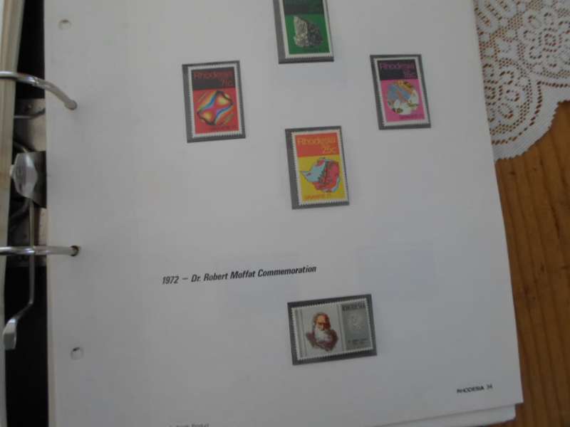 FILE RHODESIA MINT STAMPS ONLY SOME PAGES SCANNED SEE PICS