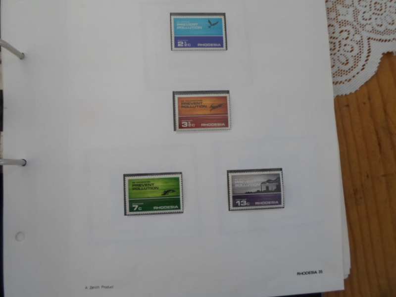 FILE RHODESIA MINT STAMPS ONLY SOME PAGES SCANNED SEE PICS