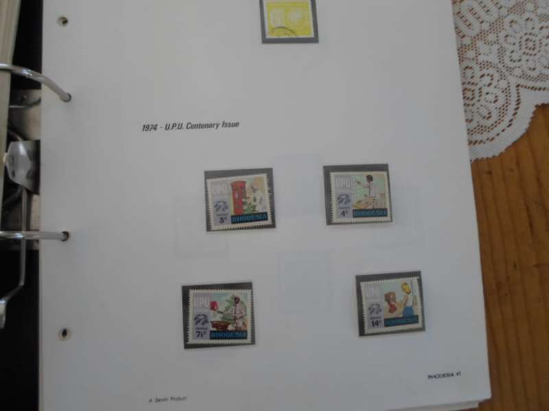 FILE RHODESIA MINT STAMPS ONLY SOME PAGES SCANNED SEE PICS
