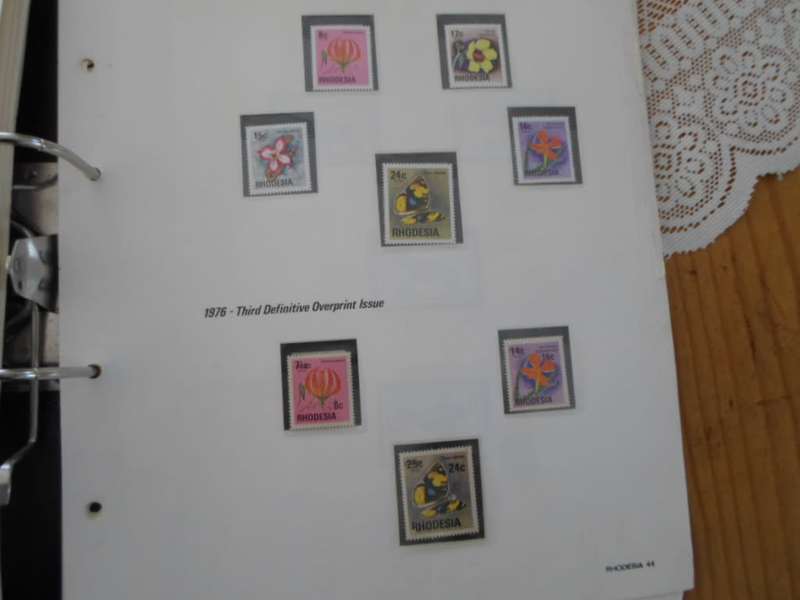 FILE RHODESIA MINT STAMPS ONLY SOME PAGES SCANNED SEE PICS