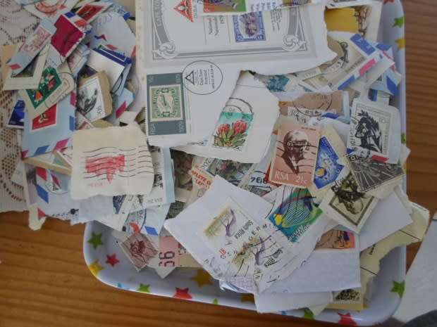 MIXED WORLD STAMPS USED ON PAPER 300 NEAT LOT SEE PICS