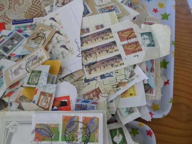 MIXED WORLD STAMPS USED ON PAPER 300 NEAT LOT SEE PICS