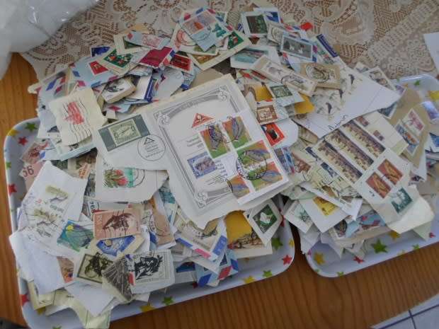 MIXED WORLD STAMPS USED ON PAPER 300 NEAT LOT SEE PICS
