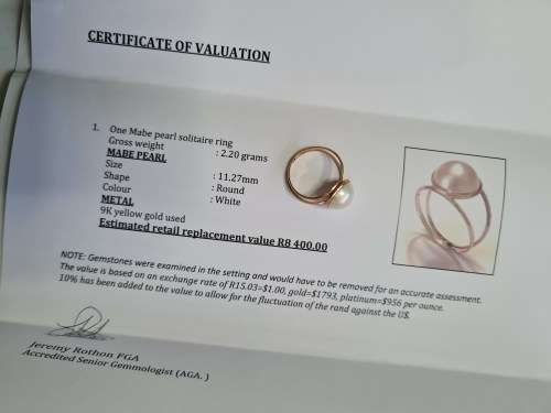 Mabe pearl solitaire ring. 2.2 gm 11.27 mm round pearl