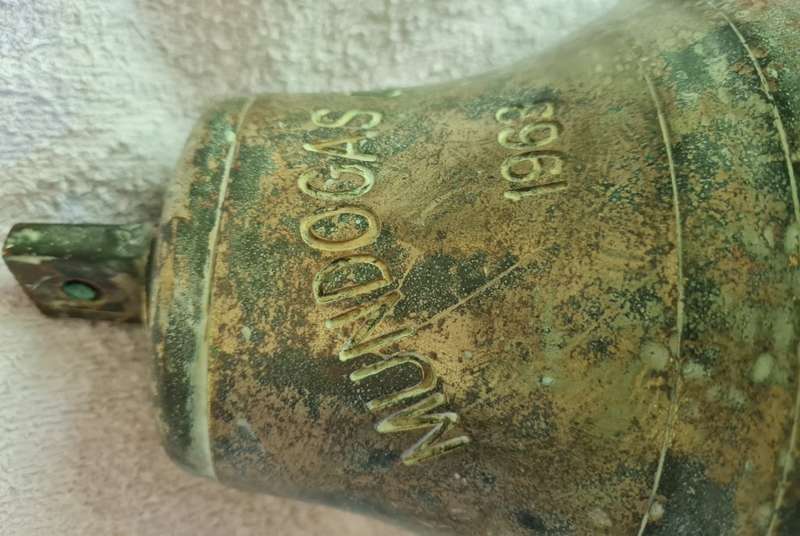 Salvaged ships brass bell from  the Mundogas Oslo