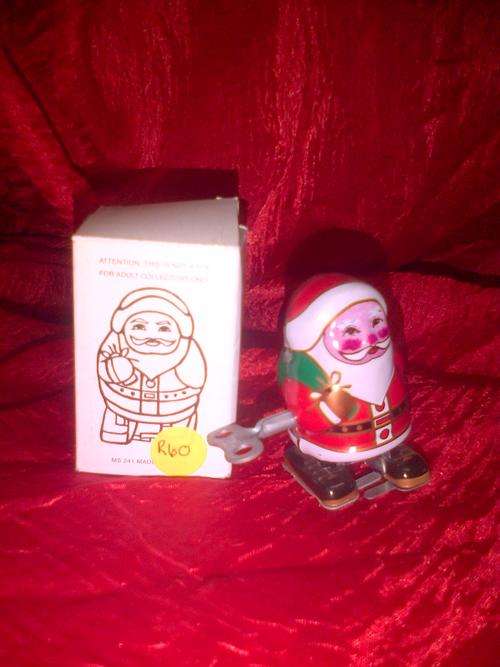metal wind up father christmas.