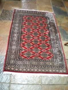 A Persian Hand Knotted Karachi carpet size 1540mm x 940mm.