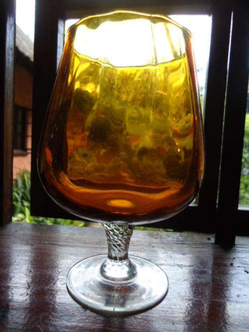 Stunning stemed amber vase