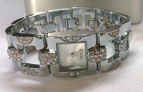 ## Brand New ## Guess Silver Stainless Steel Ladies Watch - ** Petite and Stylish **