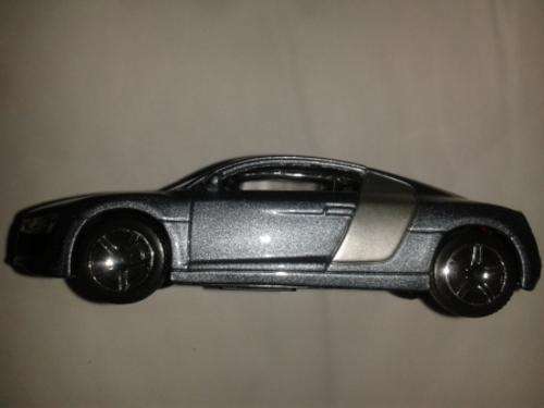 Audi R8 (Bburago Street Fire)( postage for second car R 5.00)