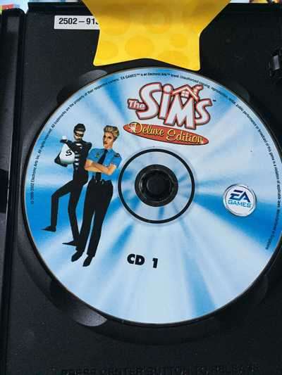 PC - THE SIMS DELUXE EDITION (WITH BOOKLET AND LICENCE CODE)