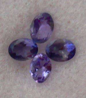 *GIFT*   SET OF 4 SPARKLY TANZANITES.  TOTAL WEIGHT: 0.650CTS /  4.0 X 3.0 MM