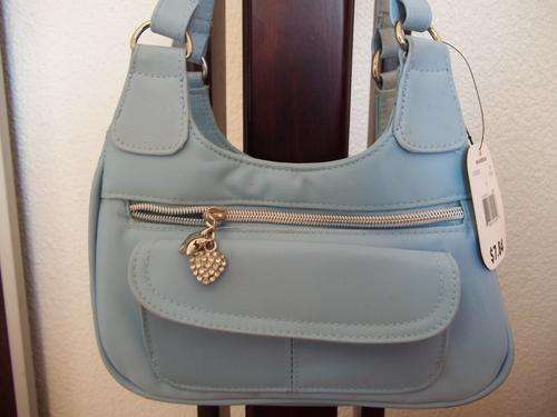 **Gorgeous ladies casual hand bag in BABY BLUE. Trendy and fashionable. A great Buy!