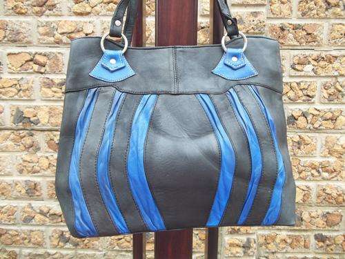 **ONLY ONE**NEW ARRIVAL**stunning 100%  Genuine leather HAND Bag in BLACK & BLUE!.