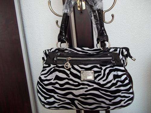 **HOT Designer style ladies hand bag in ANIMAL PRINT. Faux leather and suede. Make Fashion statement
