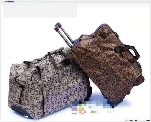 *Travel in style with this Duffel Bag with Trolley system. SIZE MED. BROWN.Great for the holidays.