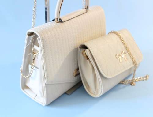 Elegant PU leather bags (set of 2) in  White-step out in style!