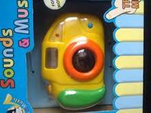 "SAY CHEESE"Battery Operated Baby camera, with lights,sound and music. Perfect entertainer for baby