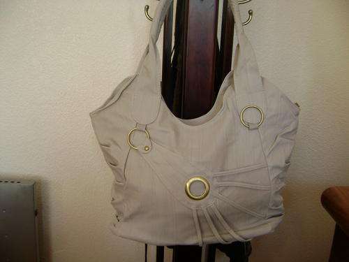 Beautiful designer style ladies Soft leather look bag in light grey. Look great anytime