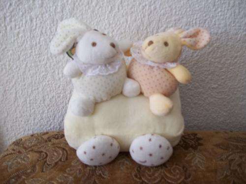 Baby rattles." SOFT AND CUDDLY." The ideal toy to keep baby busy.