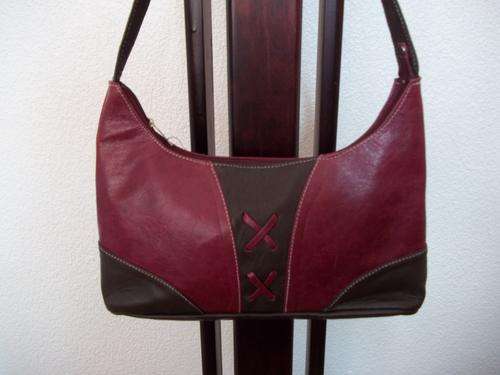 Stunning 100%  Genuine leather  Sling Bag in Beautiful Brown and maroon. For That Modern look!!
