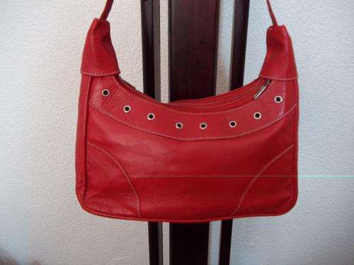 Stunning 100%  Genuine leather  Sling Bag in Beautiful Red. For That Modern look!!