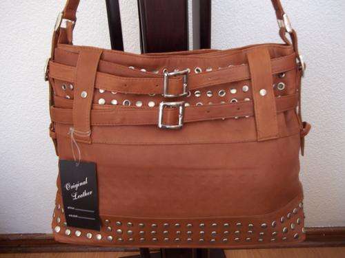 Stunning 100%  Genuine leather  Hand Bag in  Tan with stud detail . Smart choice. Made to last!!