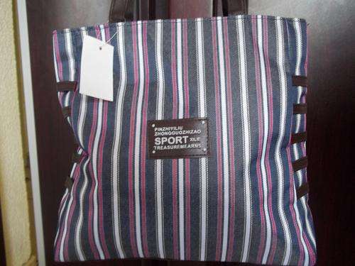 Beautiful ladies Soft canvas and leather  hand bag in STRIPES!!. Great everyday hand bag.