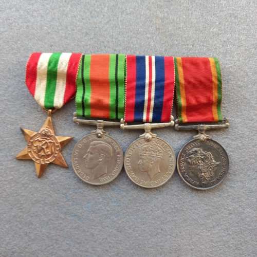 4 x COHEN. ITALY STAR, DEFENCE MEDAL 1939-1945, MERITIOUS AWARD MEDAL, AFRICA SILVER MEDAL.