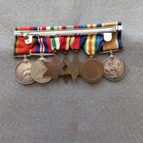 SET OF 7 MEDALS COMPLETE WITH RIBBONS AND BAR. J.N. GIRVIN. No. 233656. WW1 and WW2 ON SET