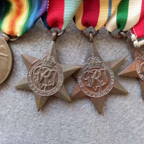SET OF 7 MEDALS COMPLETE WITH RIBBONS AND BAR. J.N. GIRVIN. No. 233656. WW1 and WW2 ON SET