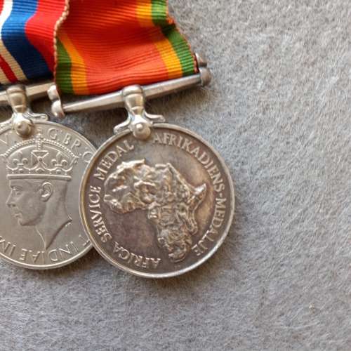 SET OF 7 MEDALS COMPLETE WITH RIBBONS AND BAR. J.N. GIRVIN. No. 233656. WW1 and WW2 ON SET