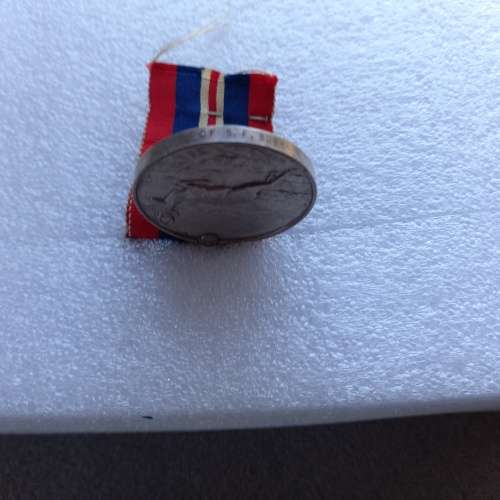 1 X WW2 FULL SIZE AFRICA SERVICE MEDAL AWARDED TO ACF S.F. BUSH.