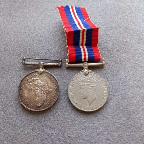2 X WW2 MEDALS: KING GEORGE 6TH 1939-1945, THE AFRICA SERVICE MEDAL AWARDED TO S.J. PITOUT. 1408