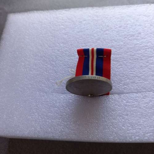 2 X WW2 MEDALS: KING GEORGE 6TH 1939-1945: THE AFRICA SERVICE MEDAL: AWARDED TO W.O. LAWRIE No... .