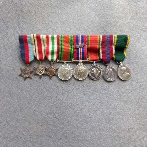 8 X MINI- WW2 MEDALS COMPLETE WITH RIBBONS AND BAR AND OAK LEAF