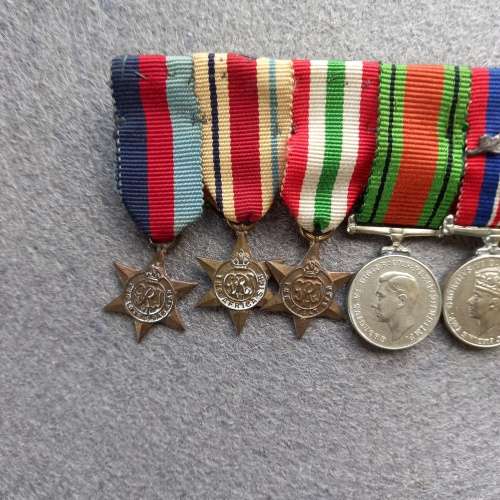 8 X MINI- WW2 MEDALS COMPLETE WITH RIBBONS AND BAR AND OAK LEAF