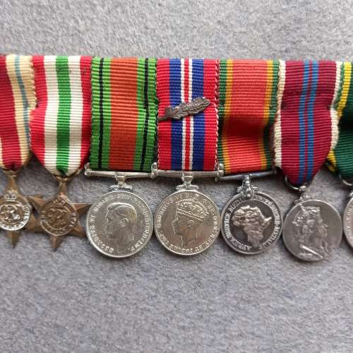 8 X MINI- WW2 MEDALS COMPLETE WITH RIBBONS AND BAR AND OAK LEAF