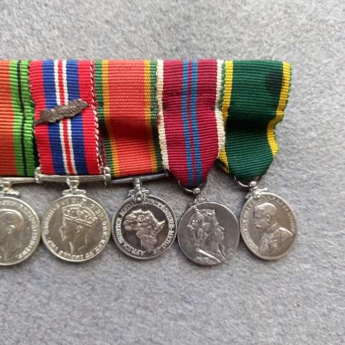 8 X MINI- WW2 MEDALS COMPLETE WITH RIBBONS AND BAR AND OAK LEAF
