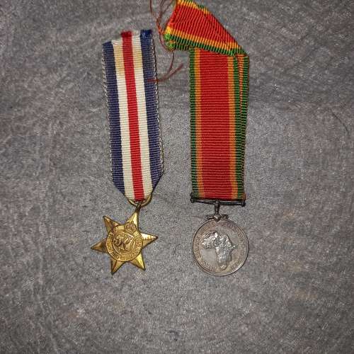 2 X WW2 MINI-MEDALS WITH RIBBON. 1)THE FRANCE AND GERMANY STAR. 2) THE AFRICA SERVICE MEDAL.