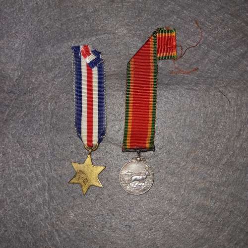 2 X WW2 MINI-MEDALS WITH RIBBON. 1)THE FRANCE AND GERMANY STAR. 2) THE AFRICA SERVICE MEDAL.