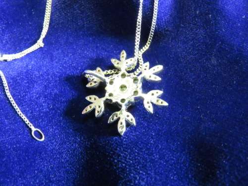 Stunning solid10kt white gold snowflake diamond pendant