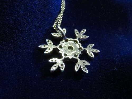 Stunning solid10kt white gold snowflake diamond pendant