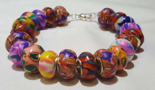 Multi-coloured roundel bead bracelet