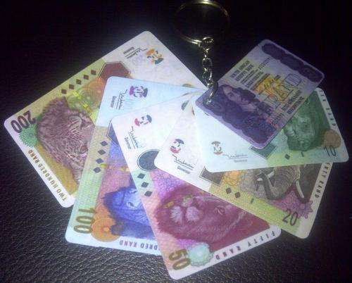 ***FIRST ON BOB***YOU WILL LOVE THIS UNIQUE MONEY KEYRING***